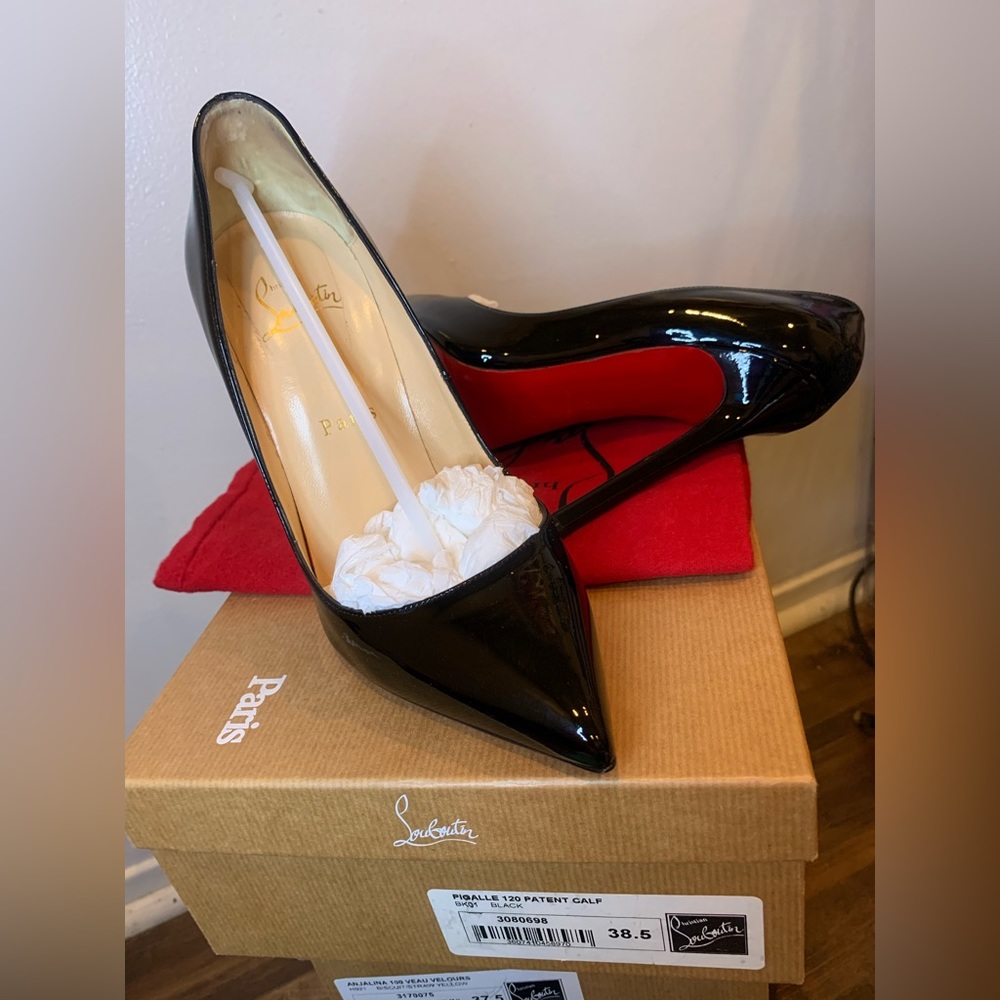 Christian Louboutin worn ones size run small black heel like new in good con.